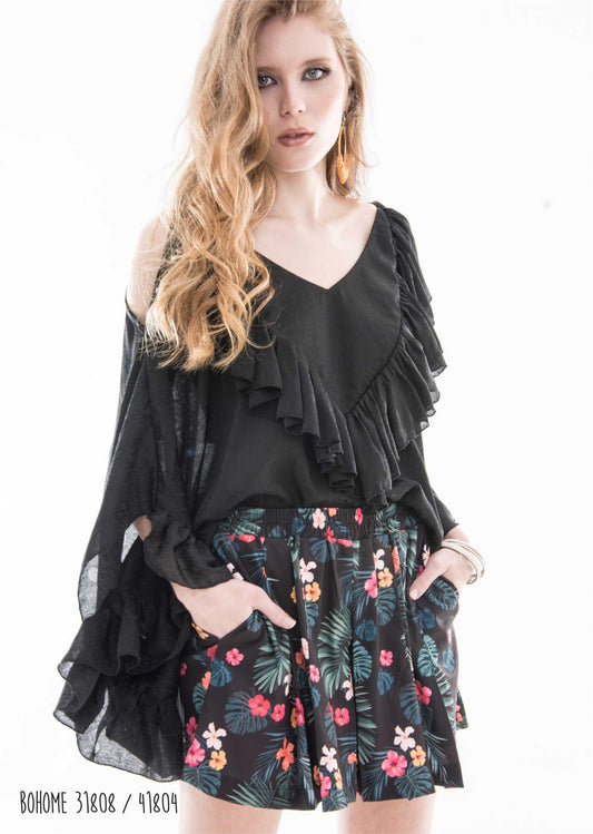 <transcy>Blusa con volantes</transcy>