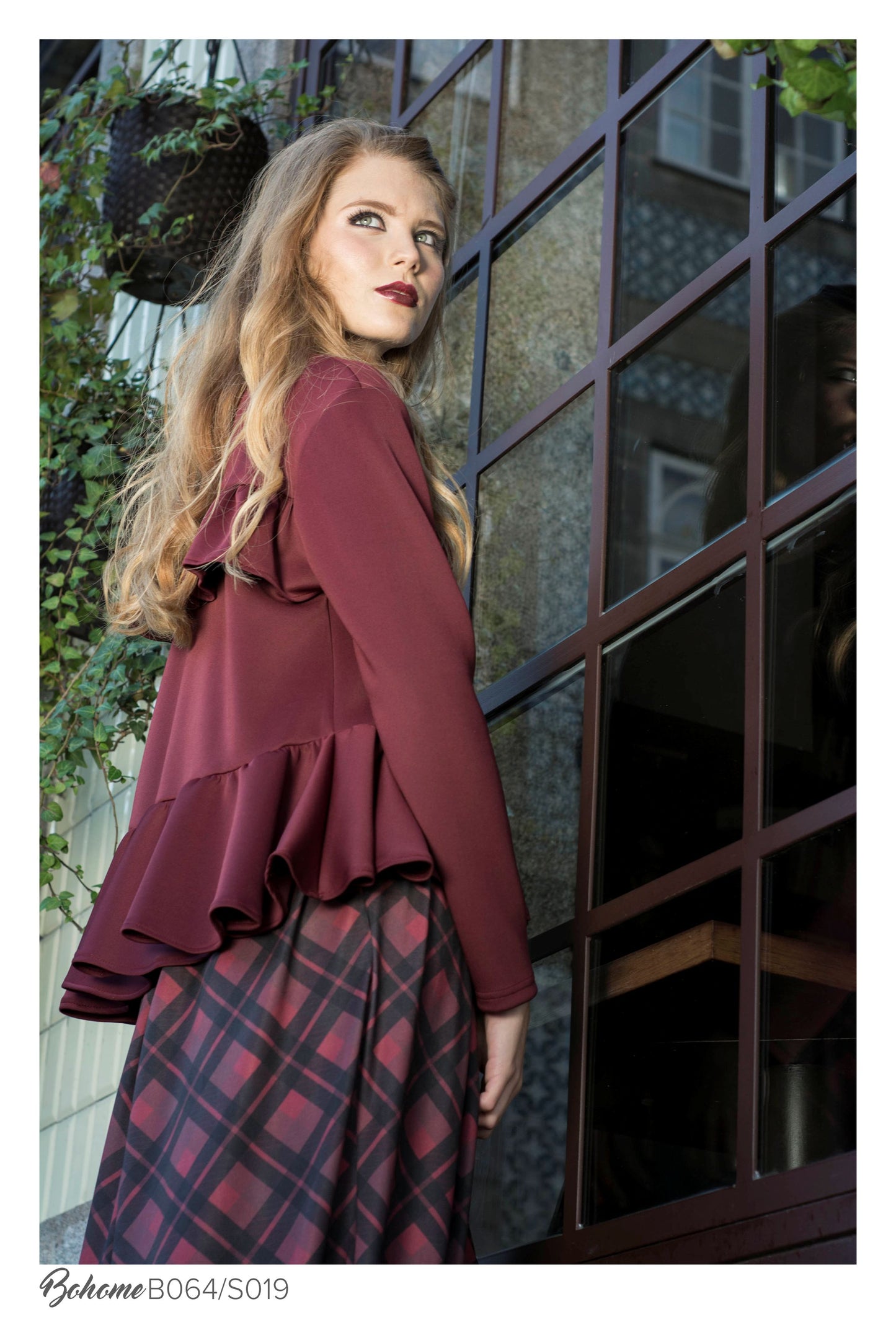 <transcy>Blusa con volante</transcy>