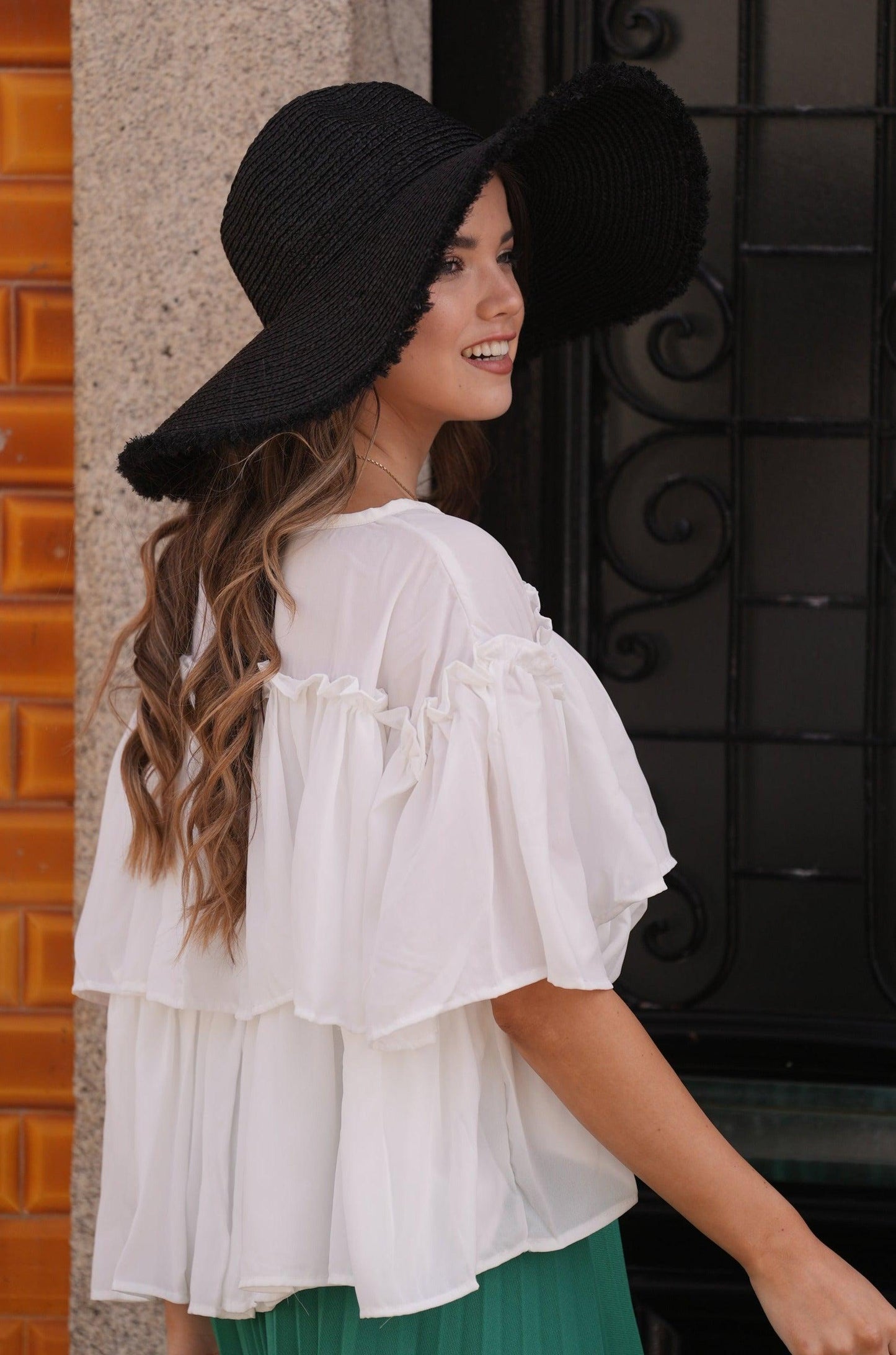 <transcy>Blusa con volantes</transcy>