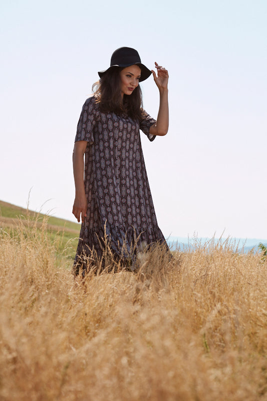 <transcy>Vestido midi volantes</transcy>