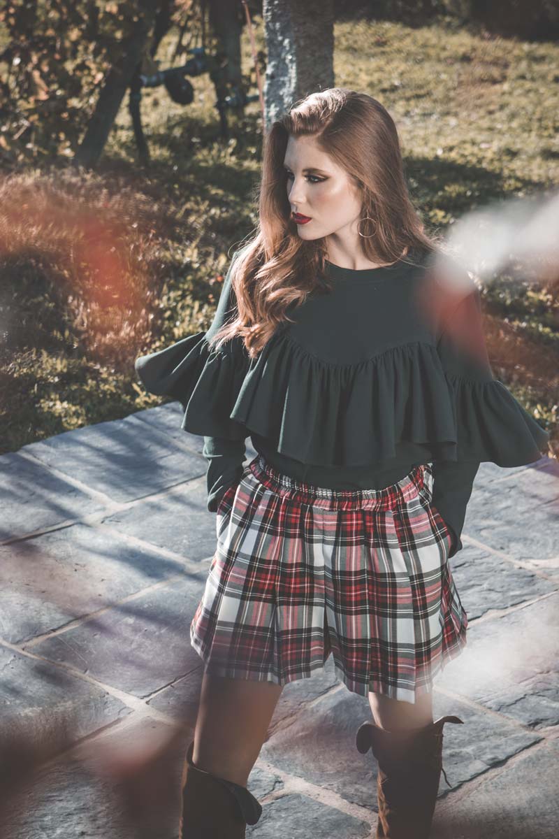 <transcy>Blusa con volante</transcy>