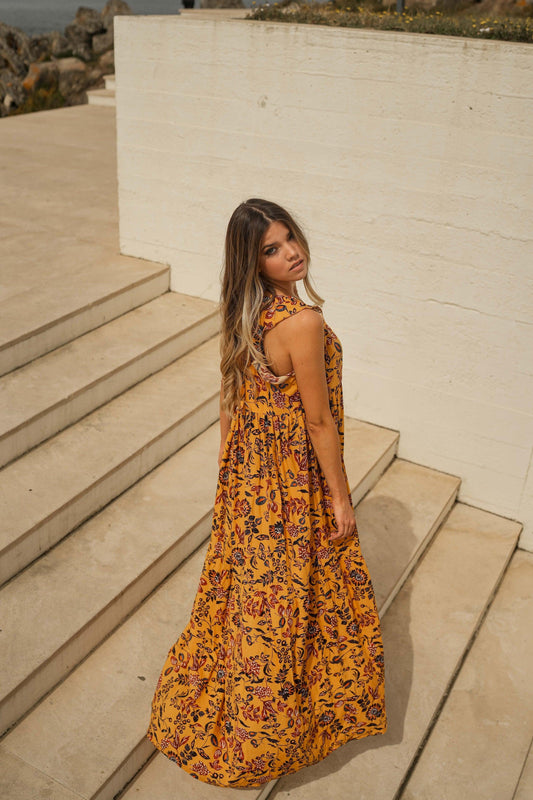 Vestido largo con volantes estampado floral